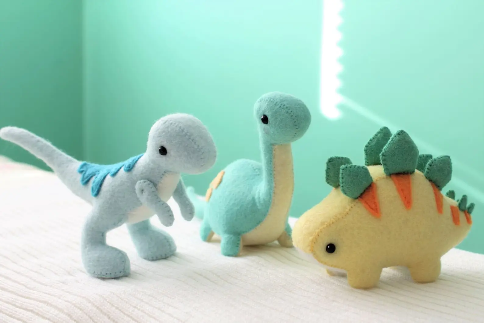 From https://www.etsy.com/uk/listing/726656083/pdf-pattern-felt-dinosaur-plush-bundle